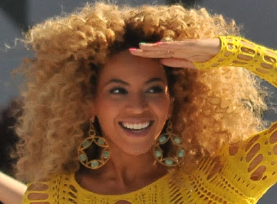Beyonce bares baby bump in star-studded Baby shower. See Pictures.